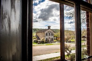 school house view from window in hotel bannack ghost town